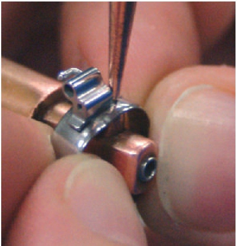 Handling a prewelded assembly under magnification